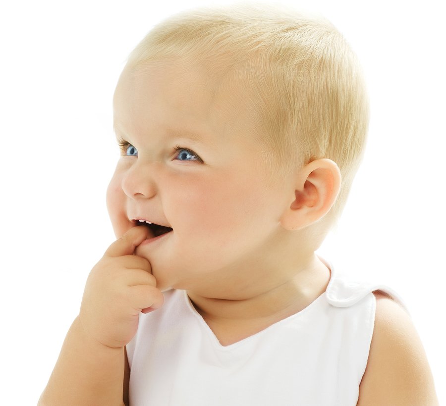 Cute Baby Girl touching her teeth