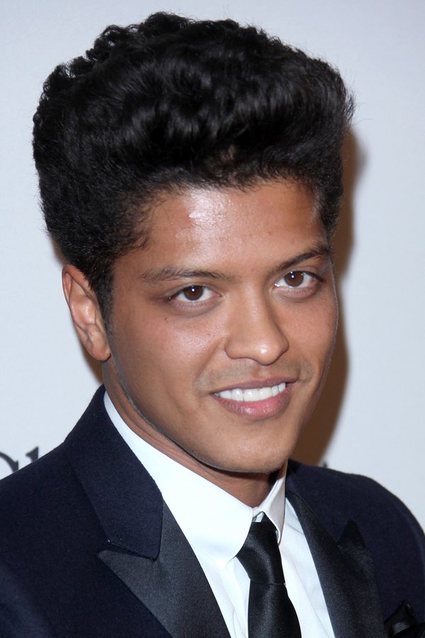 LOS ANGELES - FEB 12: Bruno Mars arrives at the 2011 Pre-GRAMMY Gala And Salute To Industry Icons at Beverly Hilton Hotel on February 12, 2011 in Beverly Hills, CA