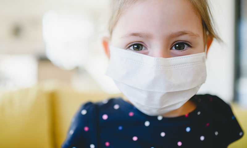 Little girl with mask