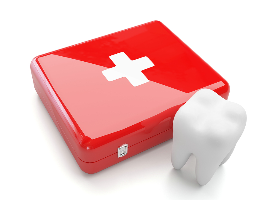 3d tooth with first aid kit isolated on white background, represents emergency dentistry