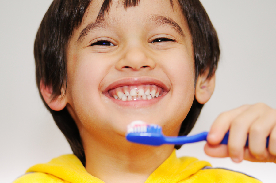 kid brushing teeth